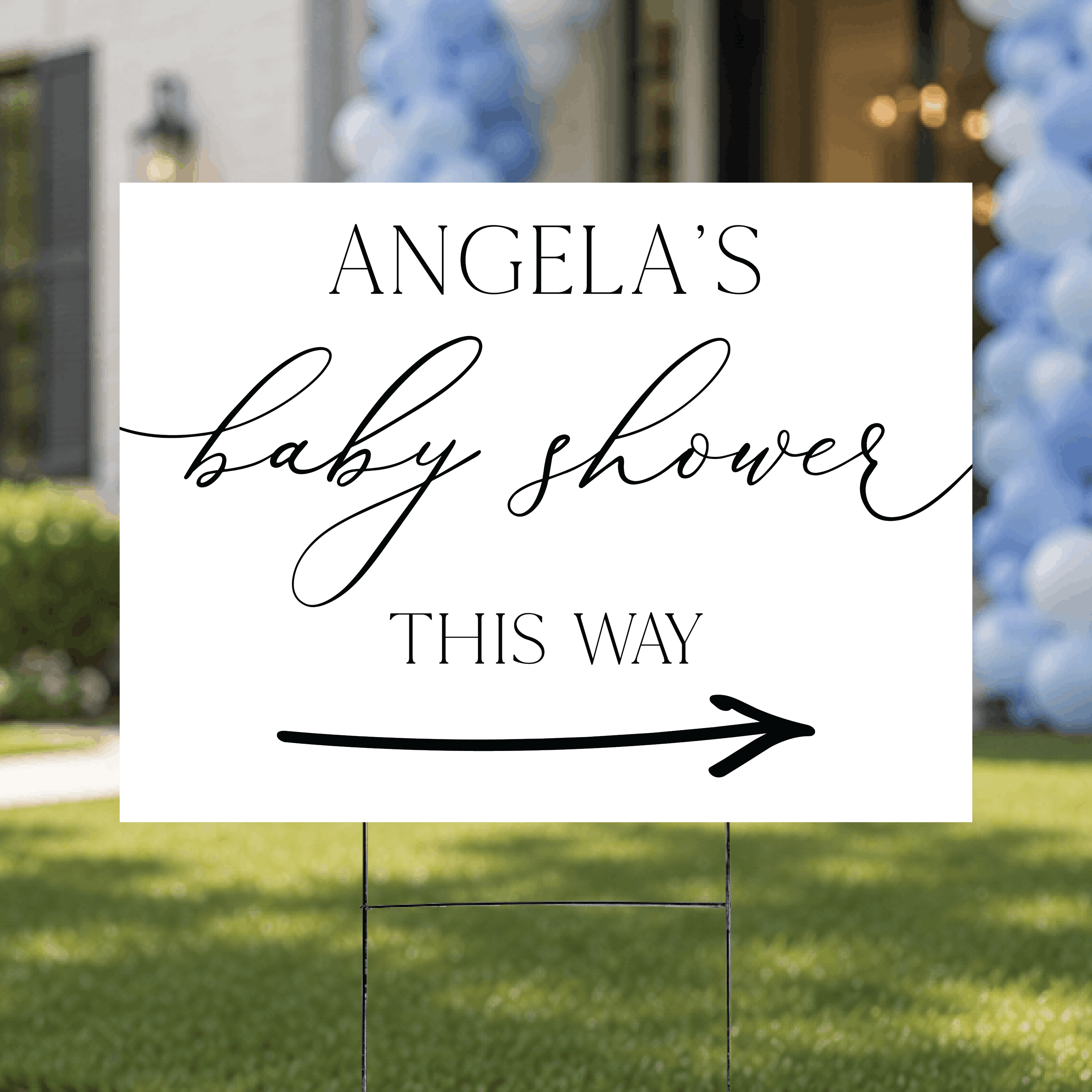 Styled flat lay of a personalized baby shower directional yard sign, highlighting the custom text and arrow design printed in UV ink.