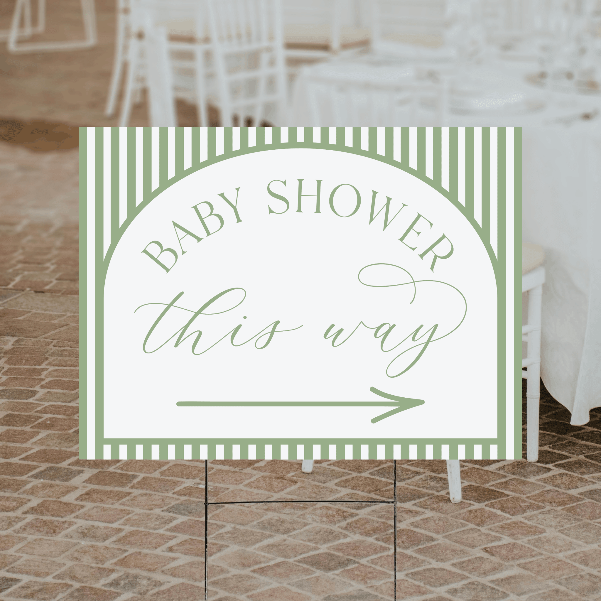 A colorful striped baby shower directional yard sign with a vibrant multi-stripe background and arrow design, printed in UV ink on durable corrugated plastic.