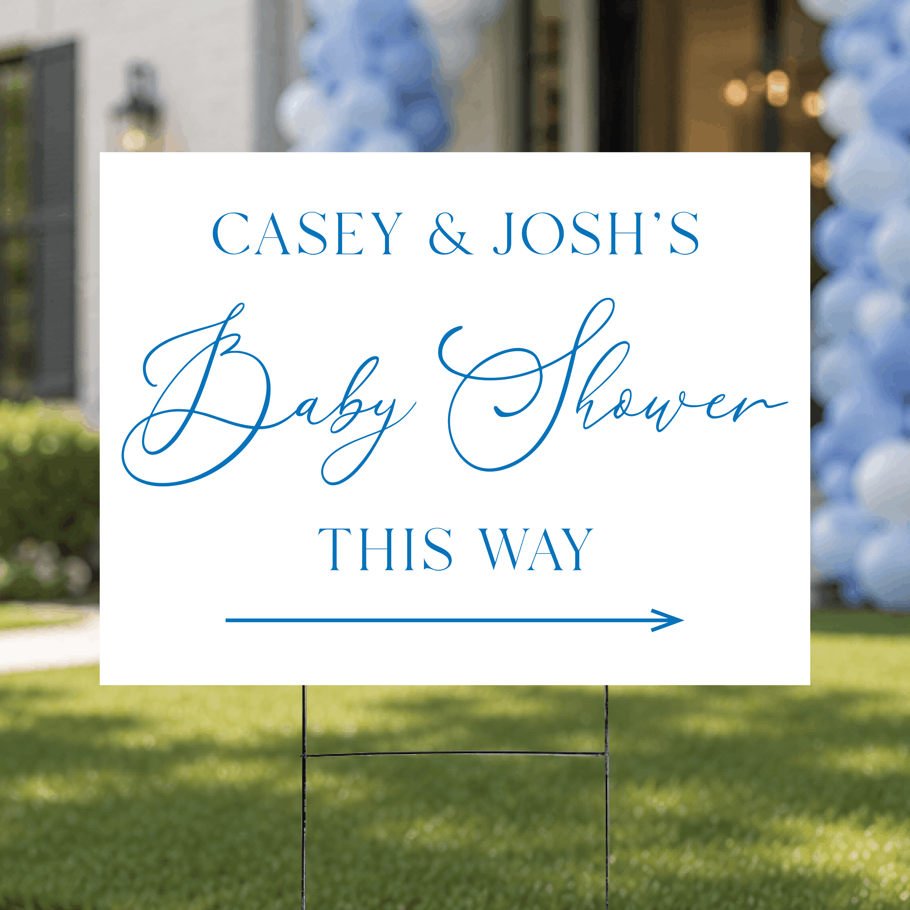 Styled flat lay of a modern script baby shower directional yard sign, highlighting the minimalist white design with custom script name and directional arrow.