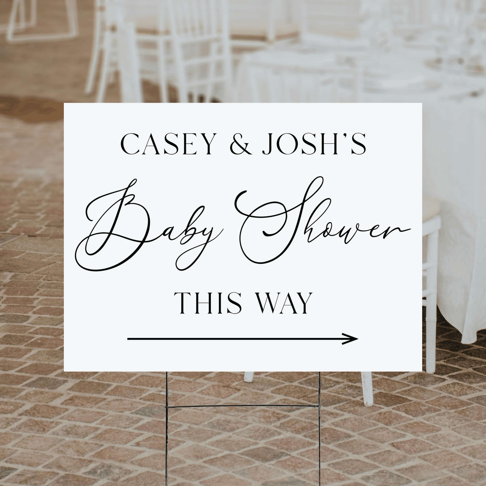 A personalized modern script baby shower directional yard sign with a clean white background, elegant mixed script and serif typography, custom name, and directional arrow.