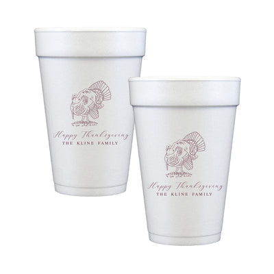 Two white foam cups in different sizes, featuring a detailed reddish-brown line art illustration of a turkey, ideal for a personalized Thanksgiving celebration.
