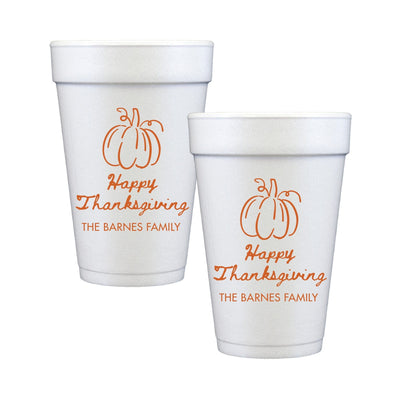 A set of white foam cups featuring a festive orange pumpkin design, ideal for a Thanksgiving celebration.