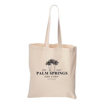 a tote bag with palm trees on it