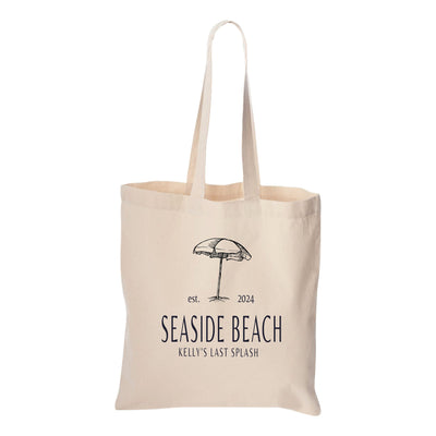 a tote bag with a picture of a beach umbrella