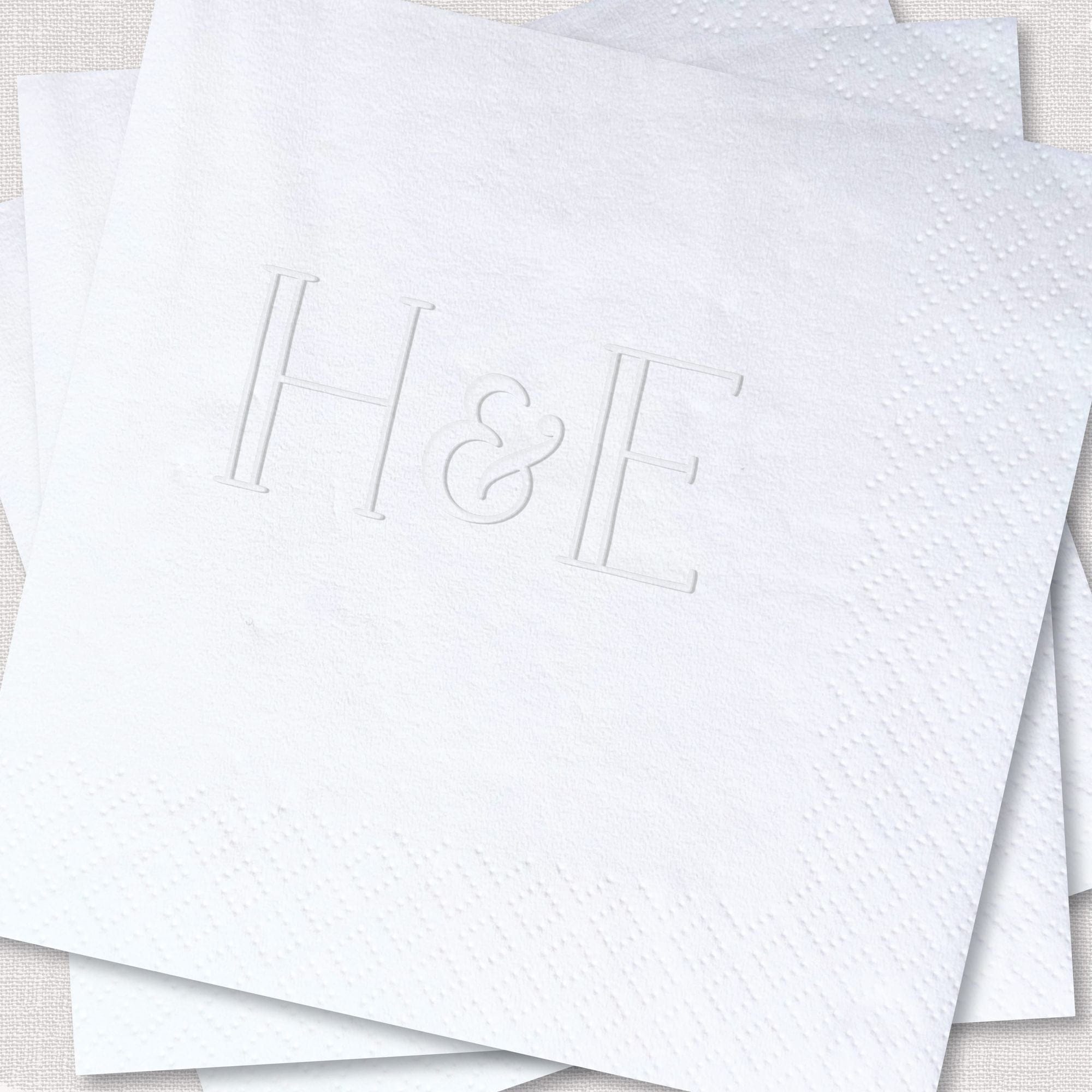 Personalized Embossed Cocktail Napkin Architectural Serif H&E Monogram Close Up White Stack – Rubi and Lib