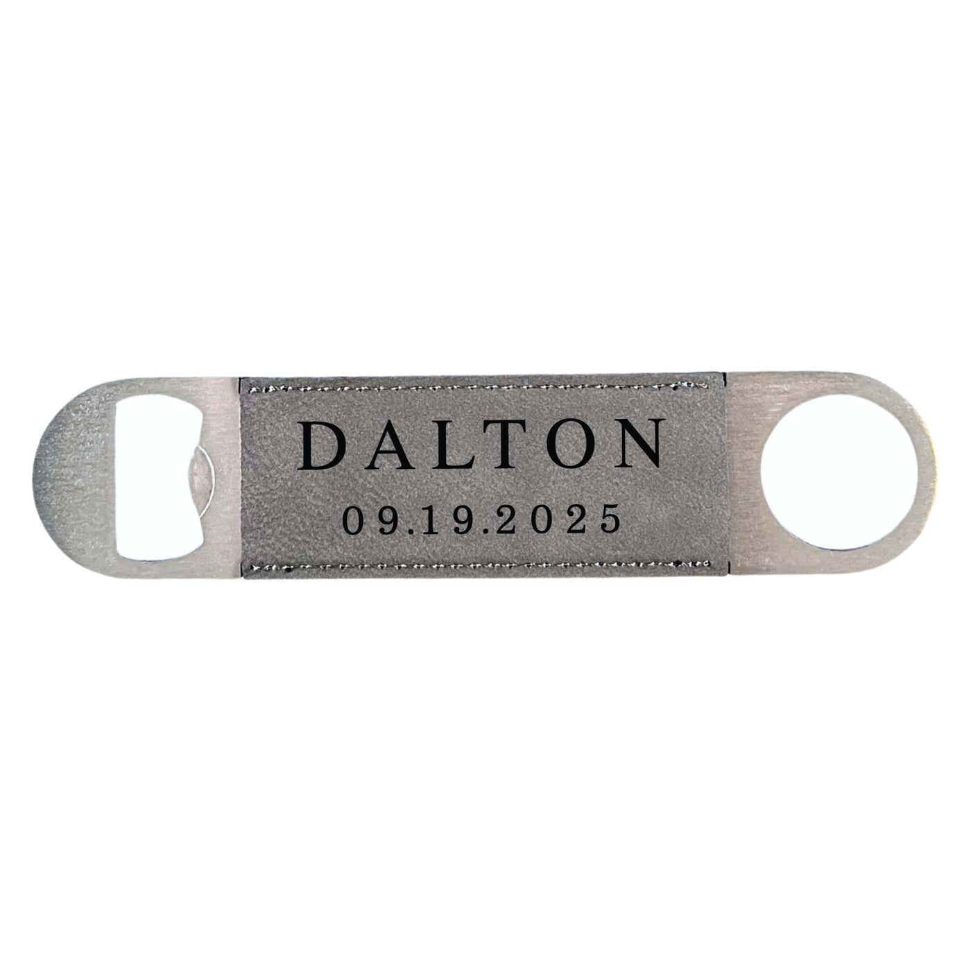 A sleek brushed metal bottle opener with a grey faux leather insert featuring visible stitching, suitable for opening beverage bottles.