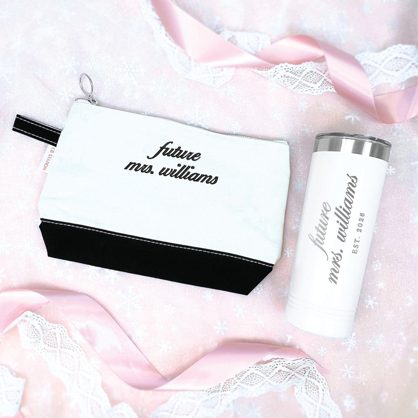 A white and black canvas zippered pouch paired with a white insulated travel tumbler, perfect as a personalized bridal shower or engagement gift for a future bride.