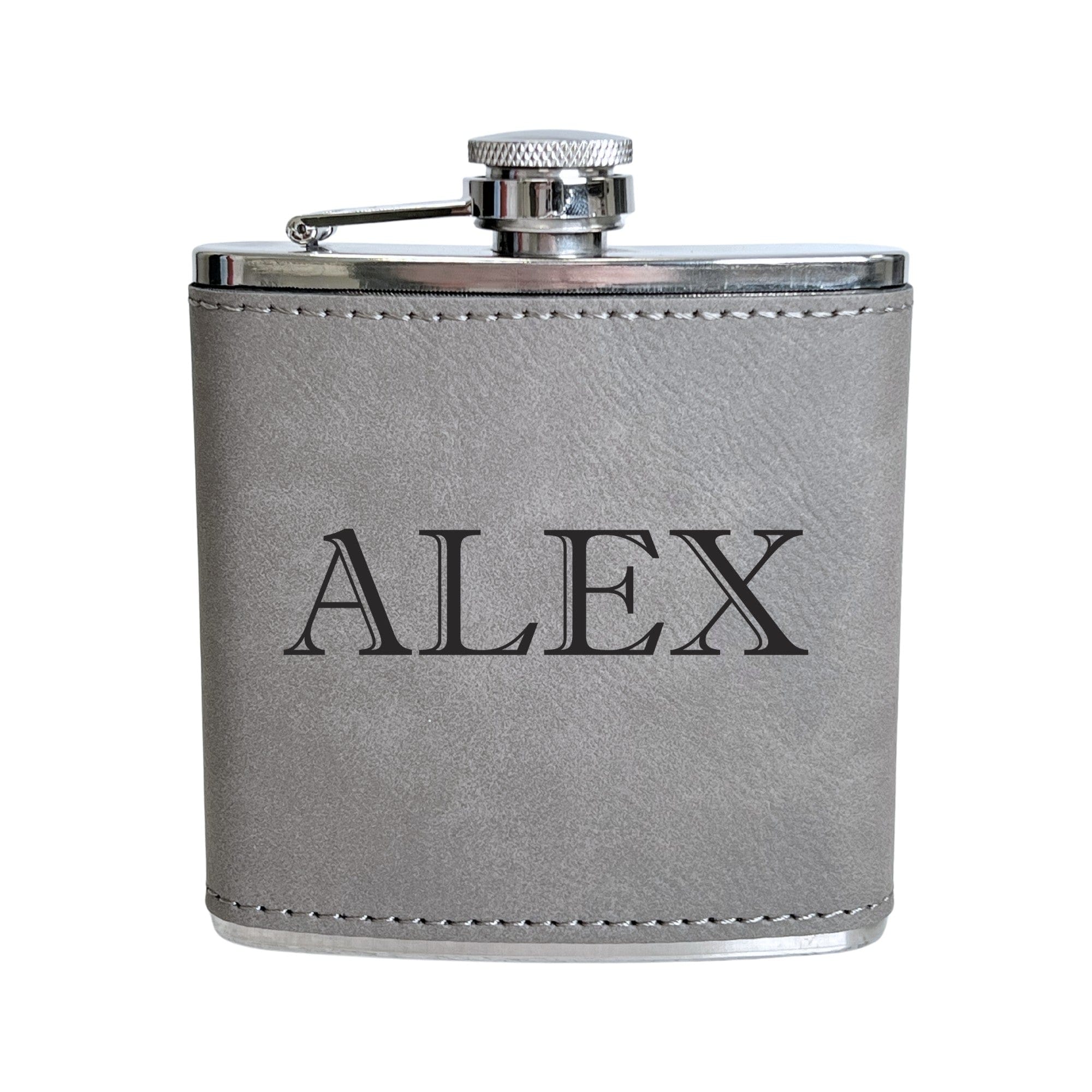 A gray leatherette-wrapped hip flask with a polished silver metal top and bottom, featuring a swing-arm cap, perfect for personalized gifting.