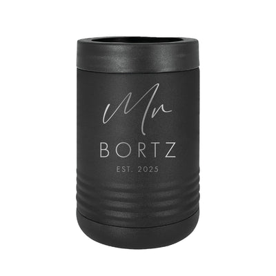 A matte black insulated metal can cooler with a textured base, featuring a silver-colored personalized design, ideal for keeping beverages cold at wedding events.