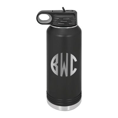 A sleek matte black insulated water bottle with a stainless steel base and a black flip-top straw lid, featuring an engraved circular design, perfect for wedding or event hydration.