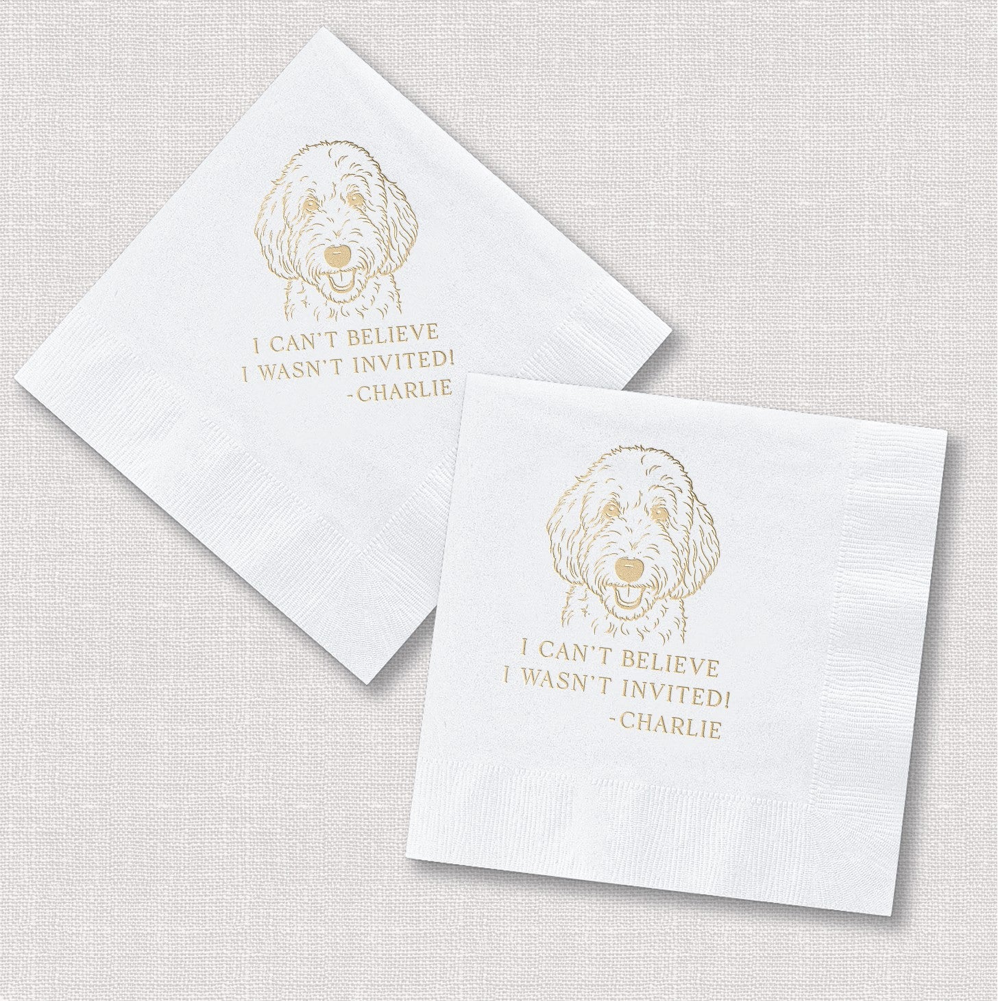 White square paper napkins with a custom gold foil printed doodle-style dog illustration and humorous text, perfect for personalized event decor.