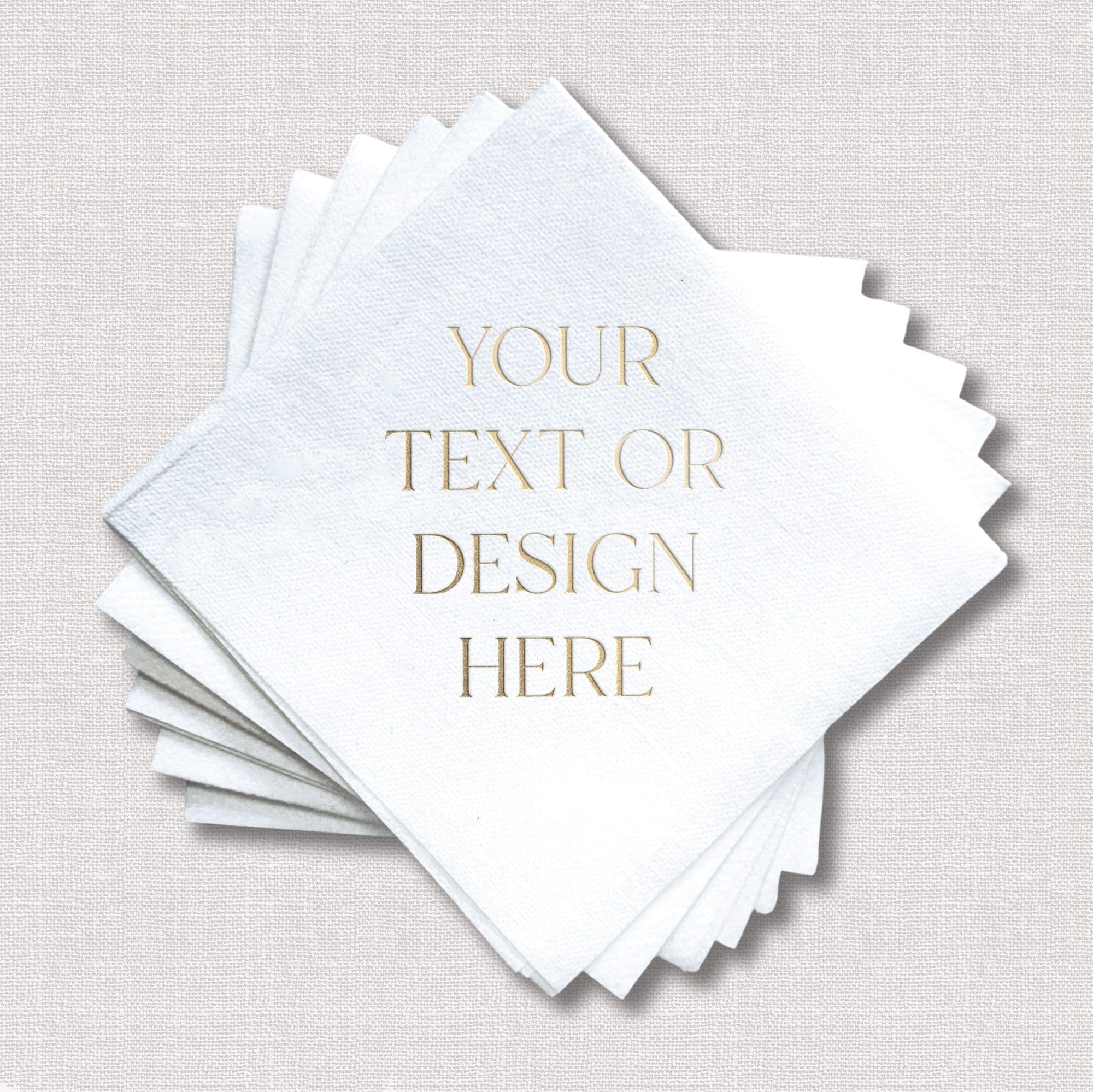 A stack of white textured paper cocktail napkins, designed for custom text or design personalization for weddings and other events.