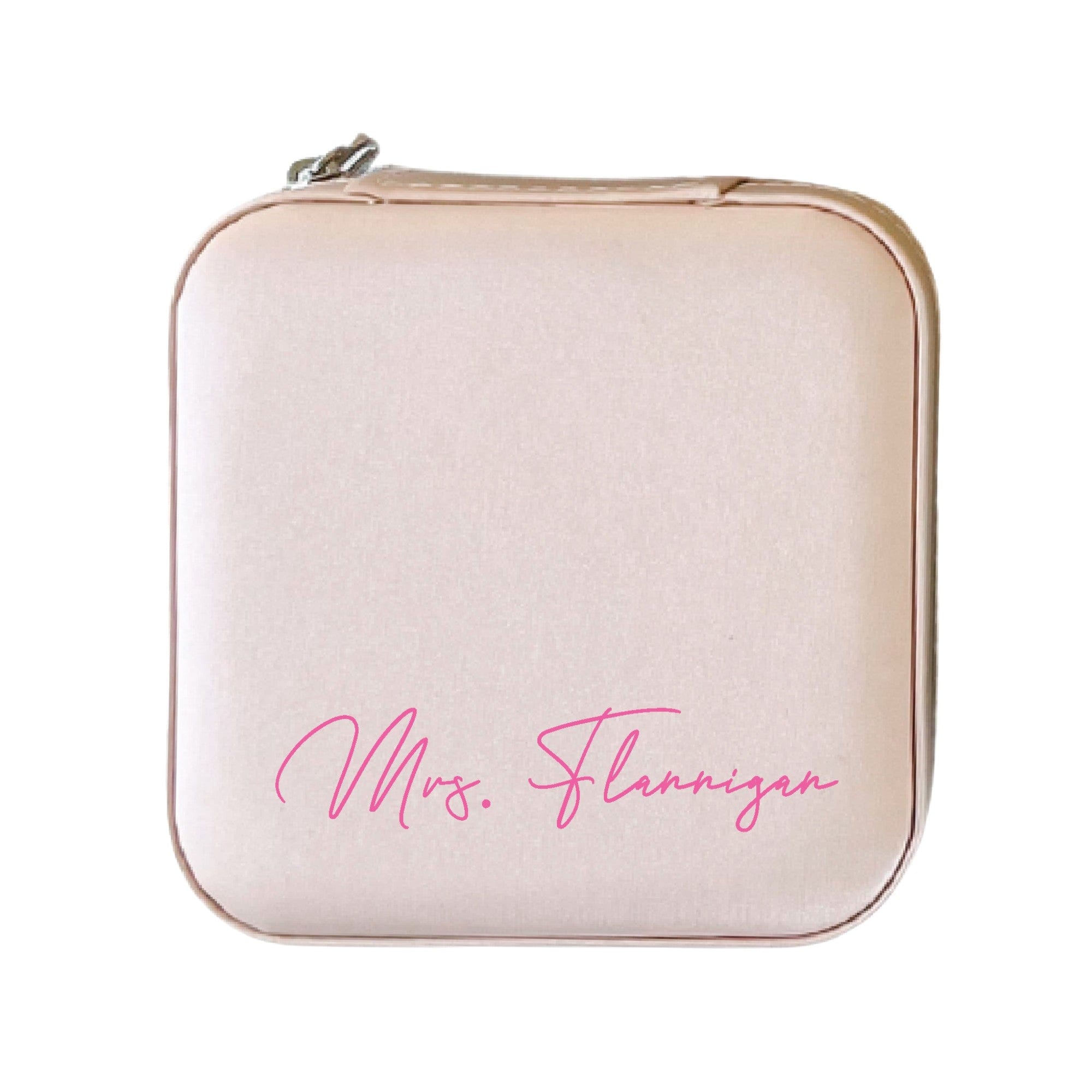 A light pink square faux leather personalized jewelry travel case with rounded corners and a silver zipper, ideal for safely storing jewelry during travel or as a special event gift.