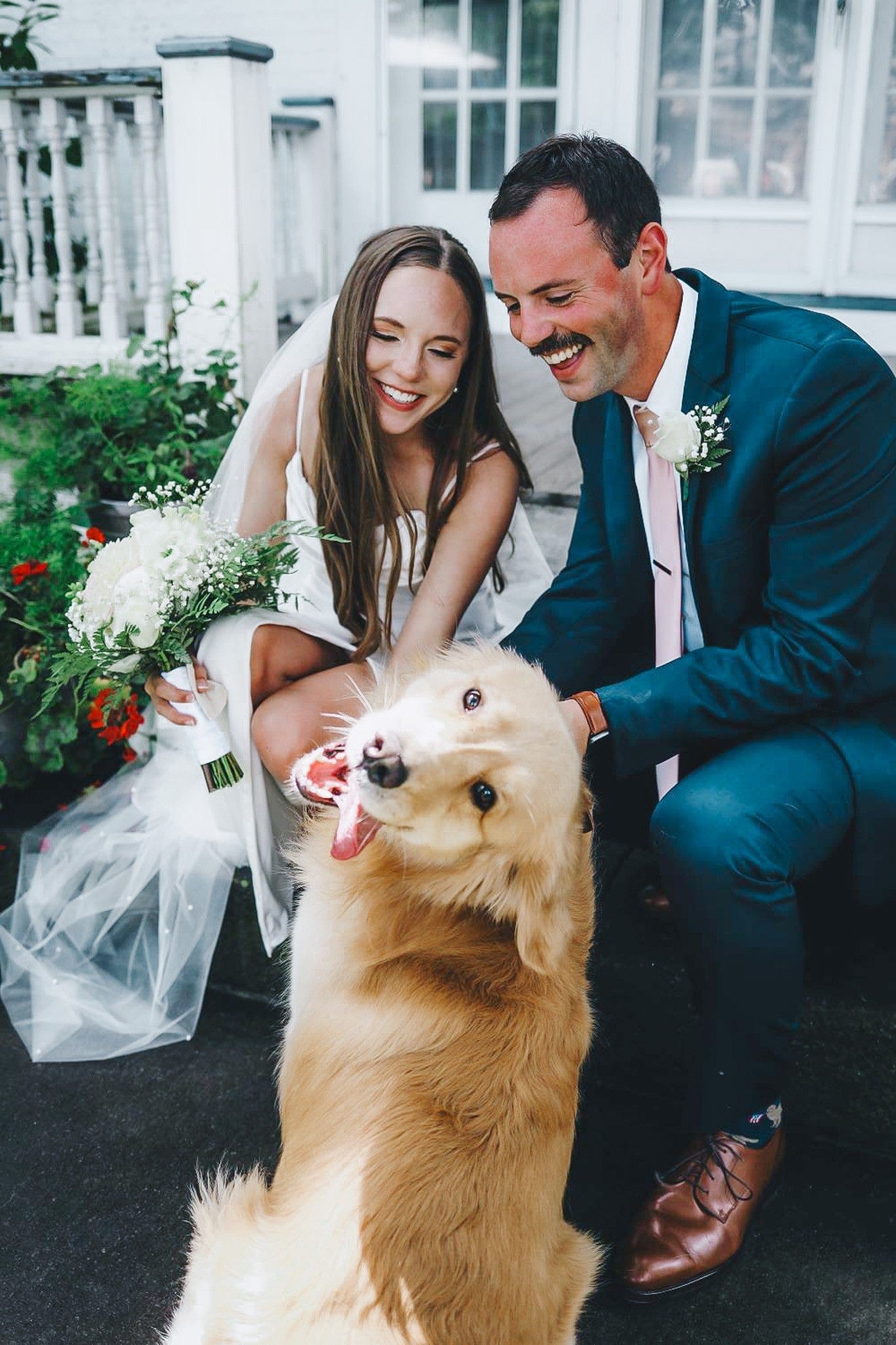 Wedding couple laughing with their golden retriever dog — pet of honor wedding inspiration from Rubi & Lib