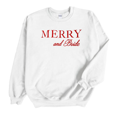 A white crewneck sweatshirt features bold red text, perfect for a festive bridal occasion.