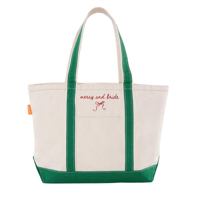 An off-white canvas tote bag with forest green handles and base features a decorative red embroidered design, perfect for a wedding or bridal shower.
