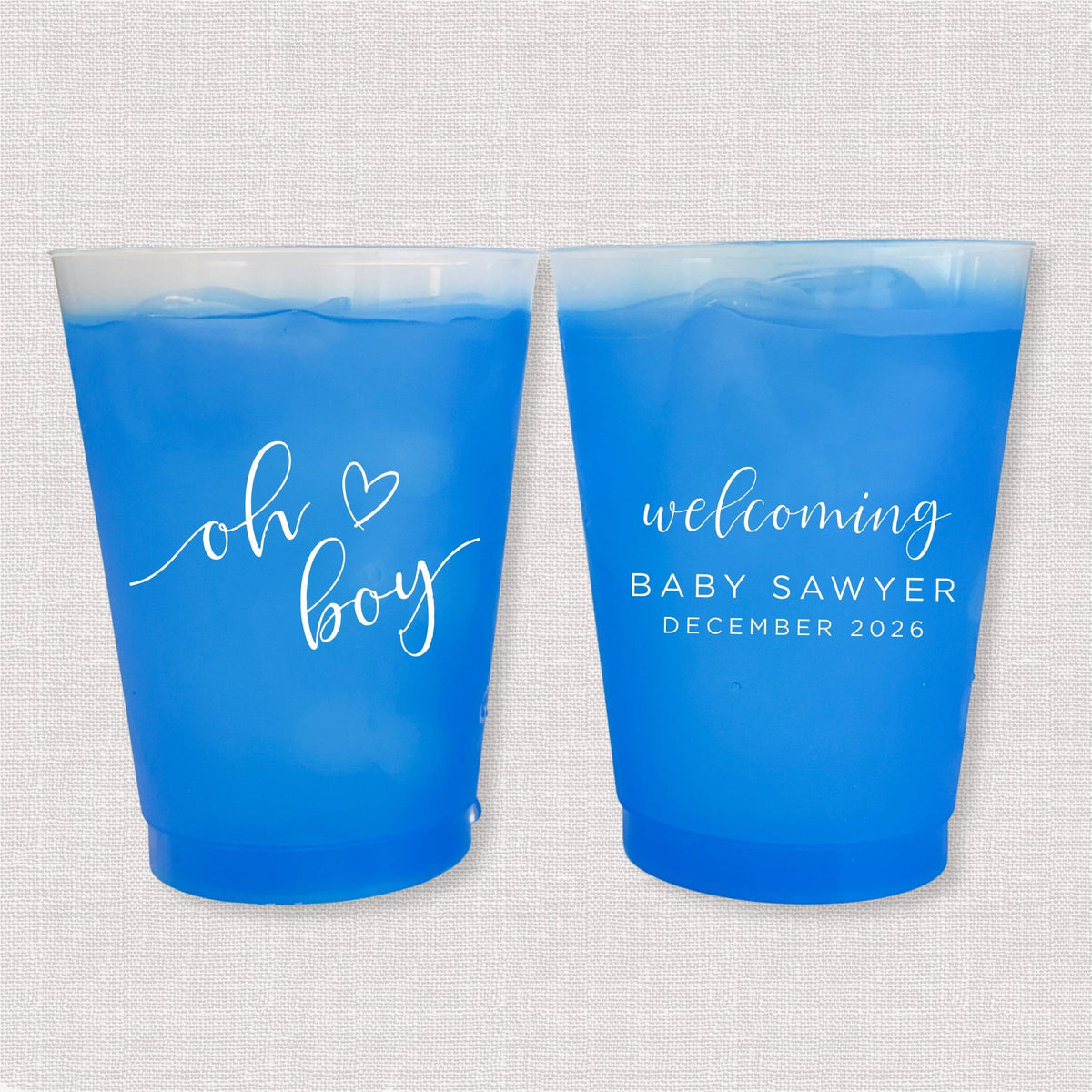 Blue color changing frosted baby shower cups with oh boy script and welcoming Baby Sawyer personalization