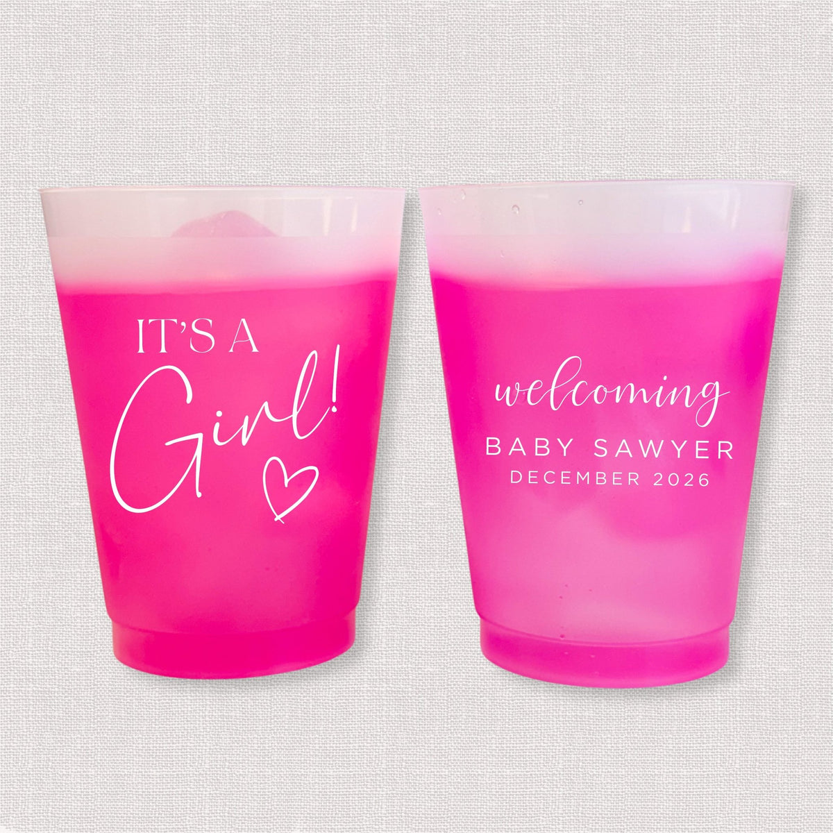Magenta color changing frosted baby shower cups with It's a Girl script and welcoming Baby Sawyer personalization