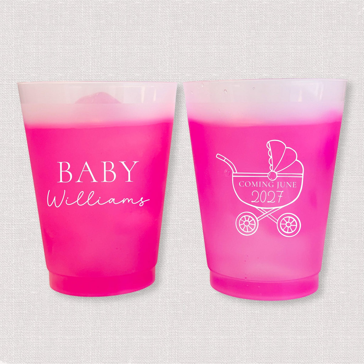 Magenta color changing frosted baby shower cups with Baby Williams script and baby carriage due date design