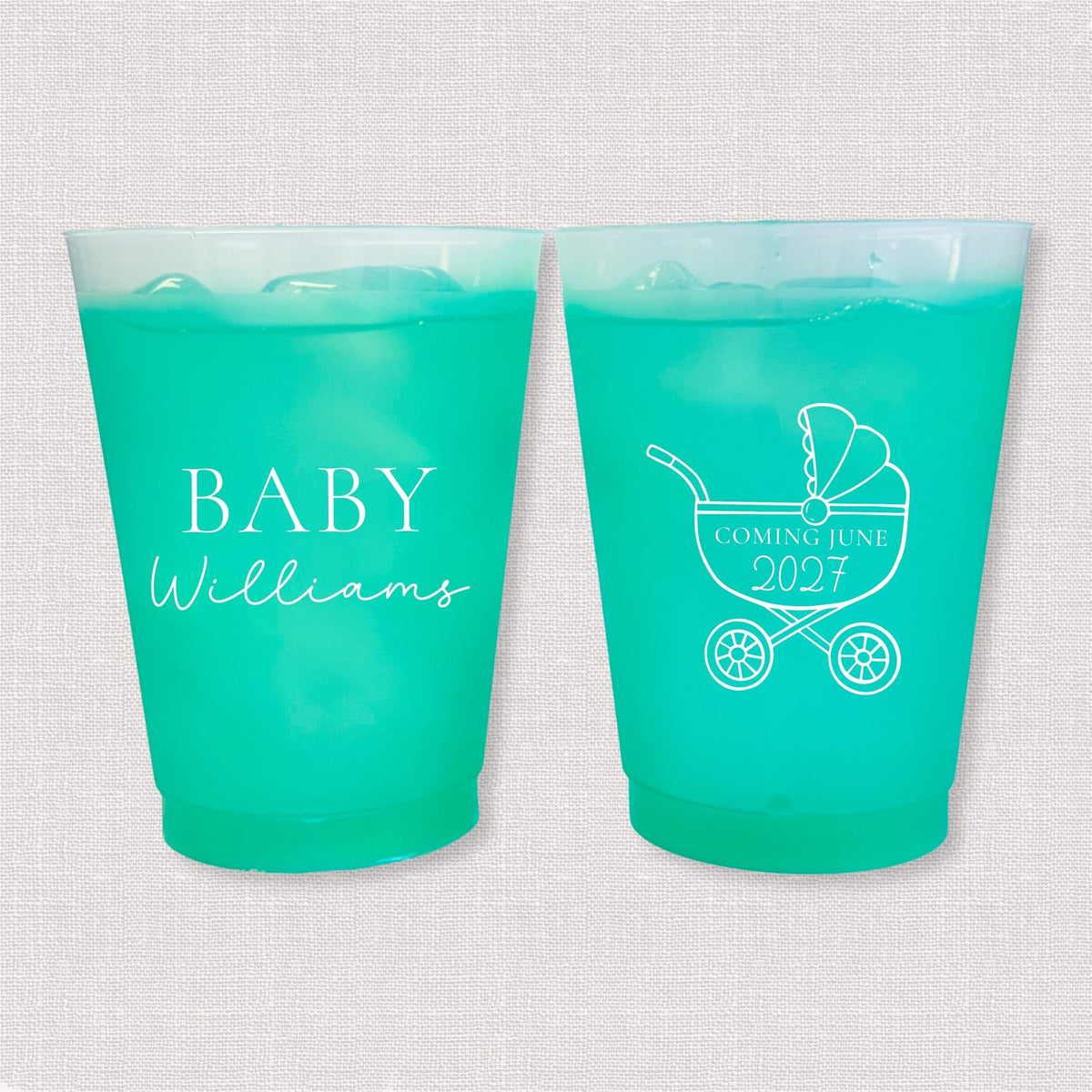 Teal color changing frosted baby shower cups with Baby Williams script and baby carriage due date design