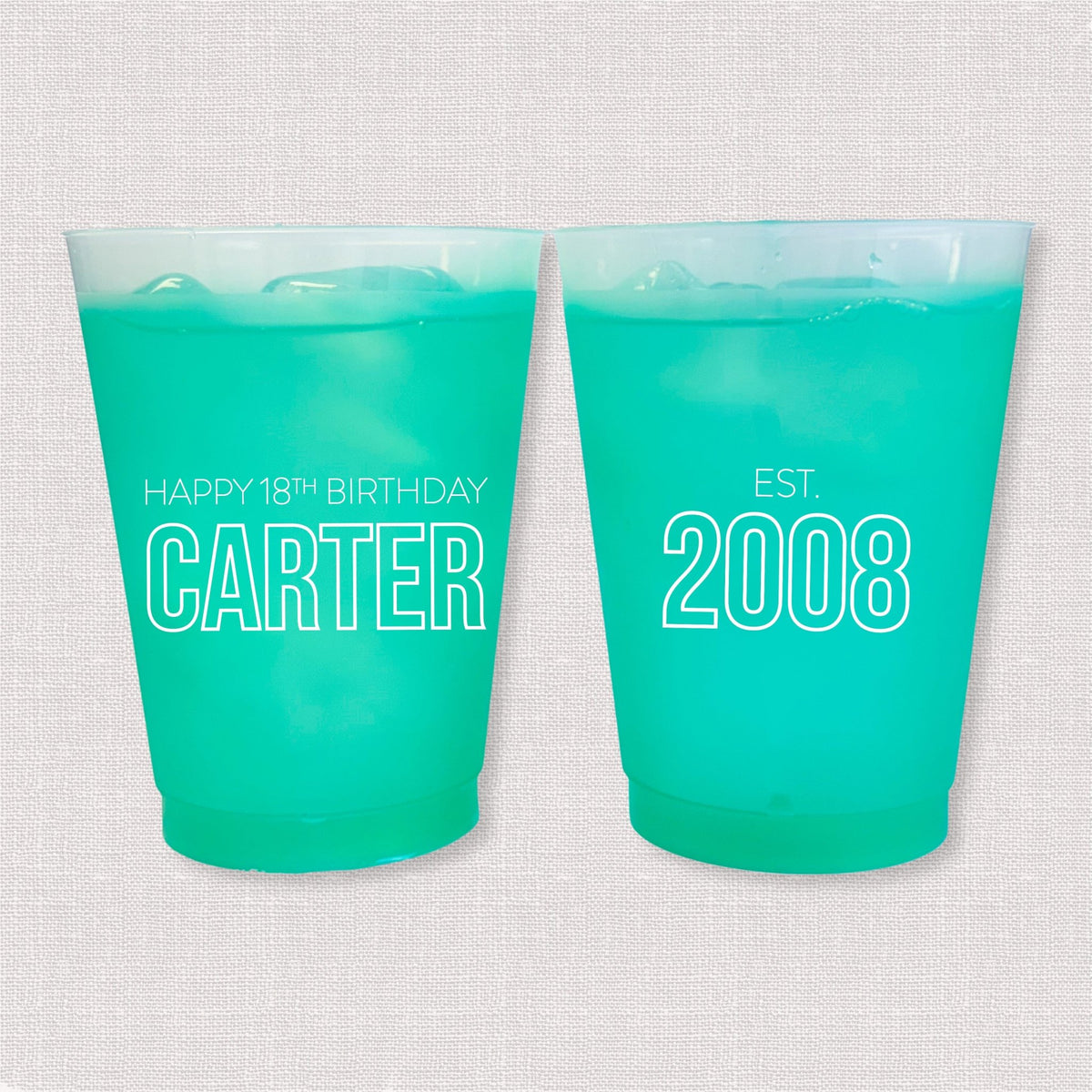 Teal color changing frosted birthday cups with Happy 18th Birthday Carter and Est. 2008 design