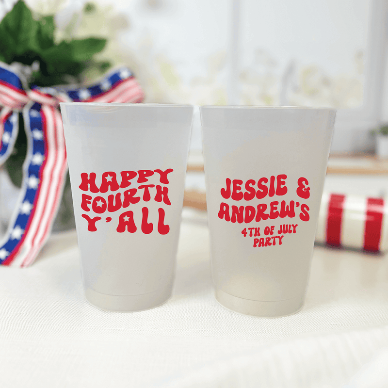 Two frosted shatterproof cups with red text, one reading "Happy Fourth Y'all" and the other personalized "Jessie & Andrew's 4th of July Party"