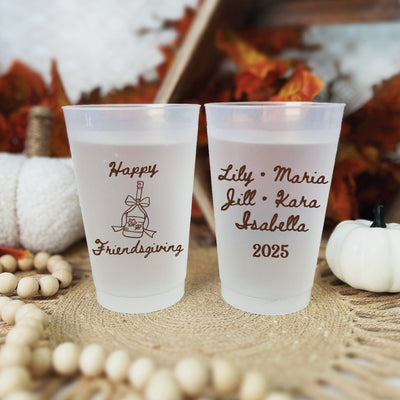 Two frosted plastic cups feature personalized brown custom designs, perfect for a fall celebration or themed event.