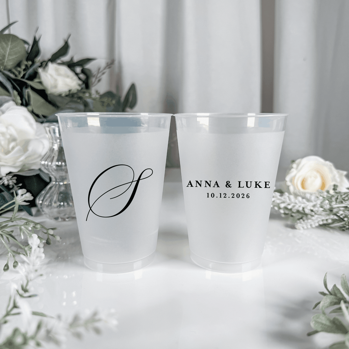 Black ink frosted shatterproof wedding cups with large script S initial and Anna & Luke wedding date