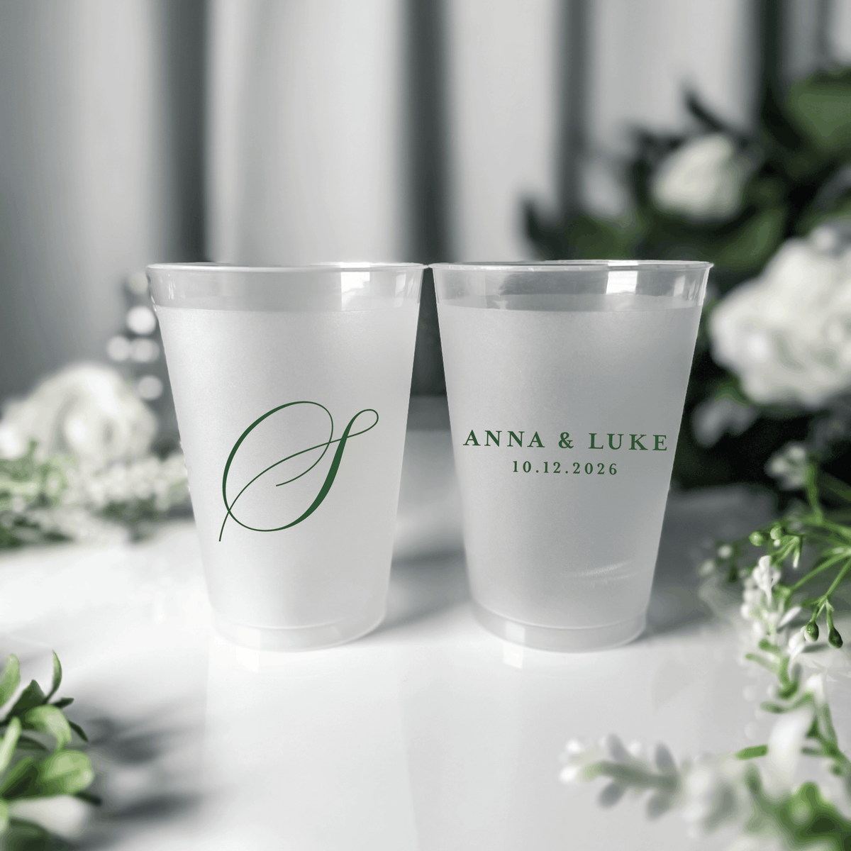 Green ink frosted shatterproof wedding cups with large script S initial and Anna & Luke wedding date