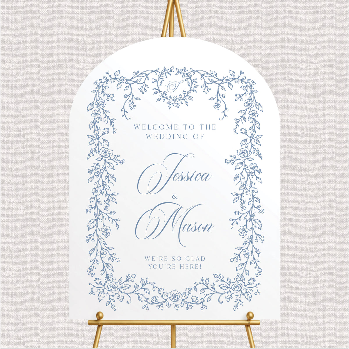Elegant arched wedding welcome sign featuring dusty blue floral line art, romantic calligraphy, and personalized couple's names.