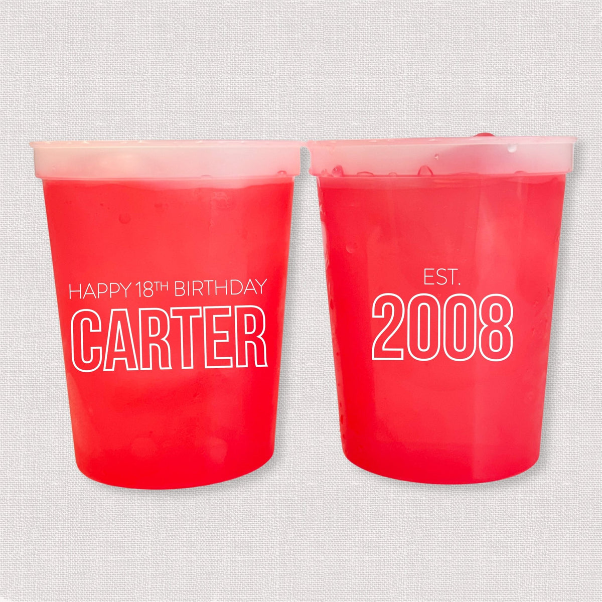 Red color changing birthday stadium cups with Happy 18th Birthday Carter and Est. 2008 design