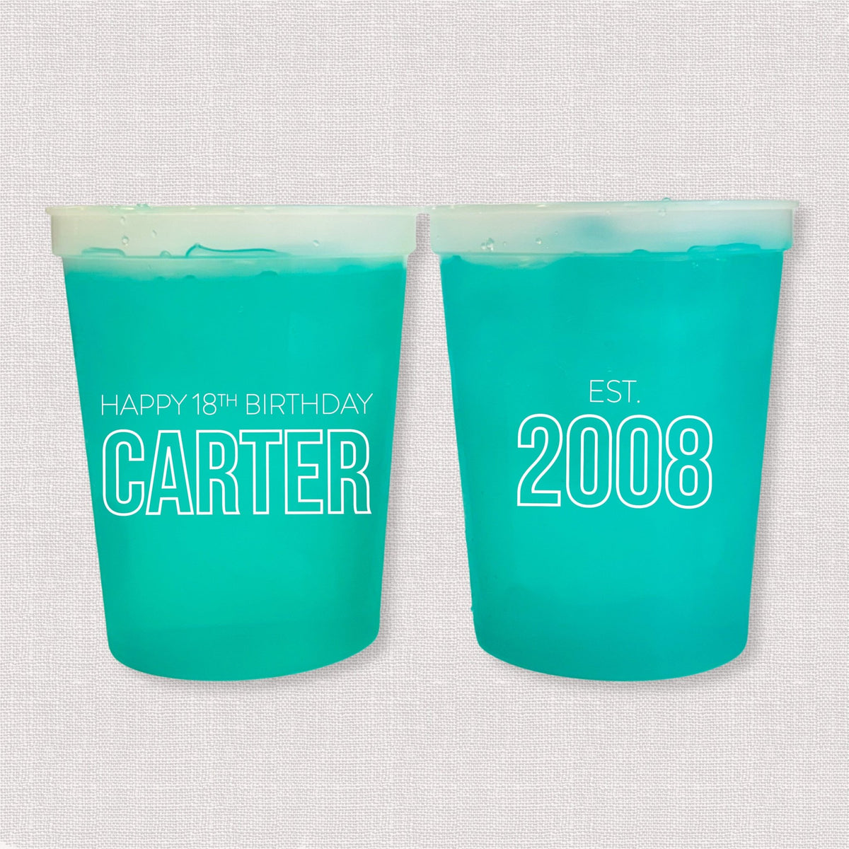 Teal color changing birthday stadium cups with Happy 18th Birthday Carter and Est. 2008 design