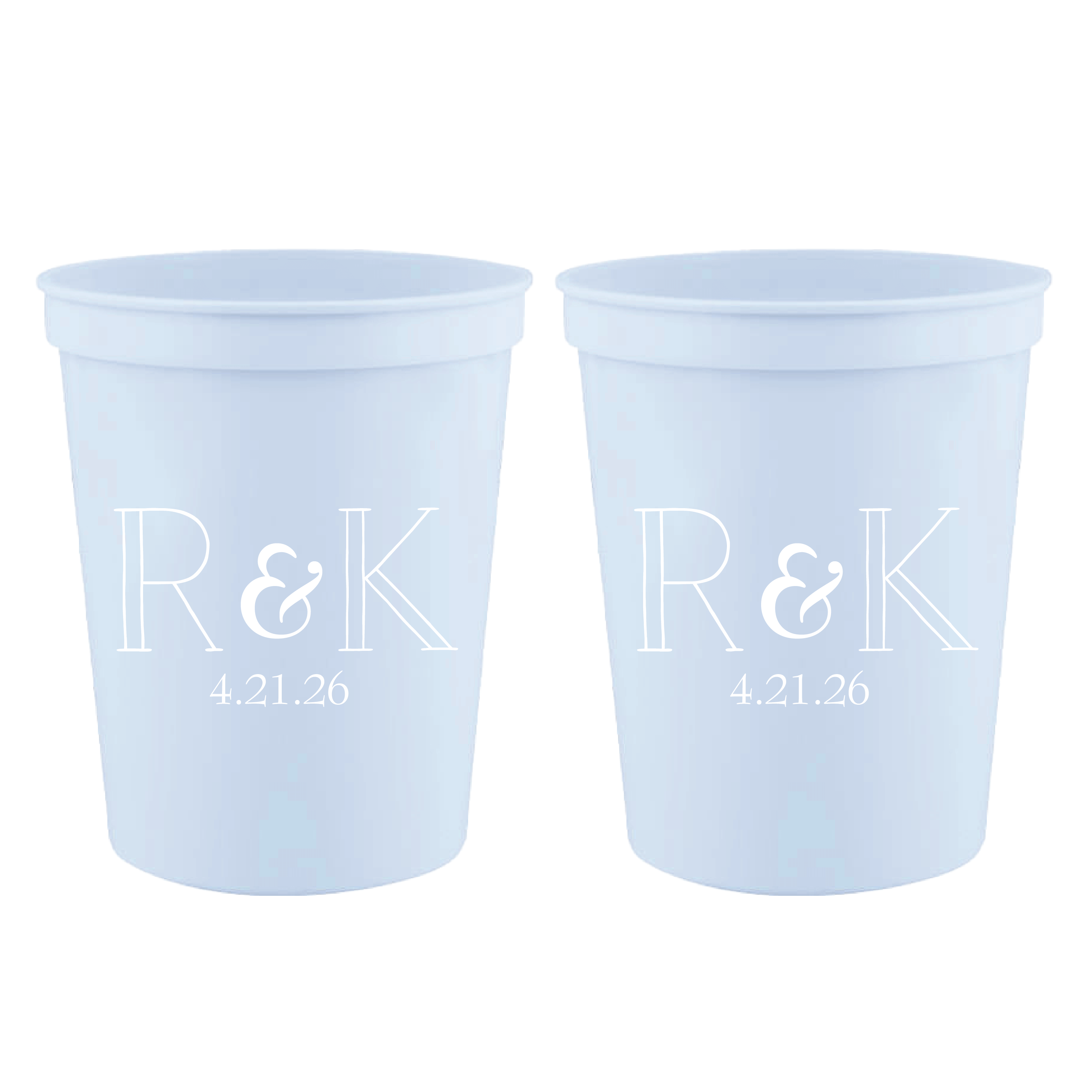 Light blue stadium cups with white monogram "R&K" and date "4.21.26" printed on front