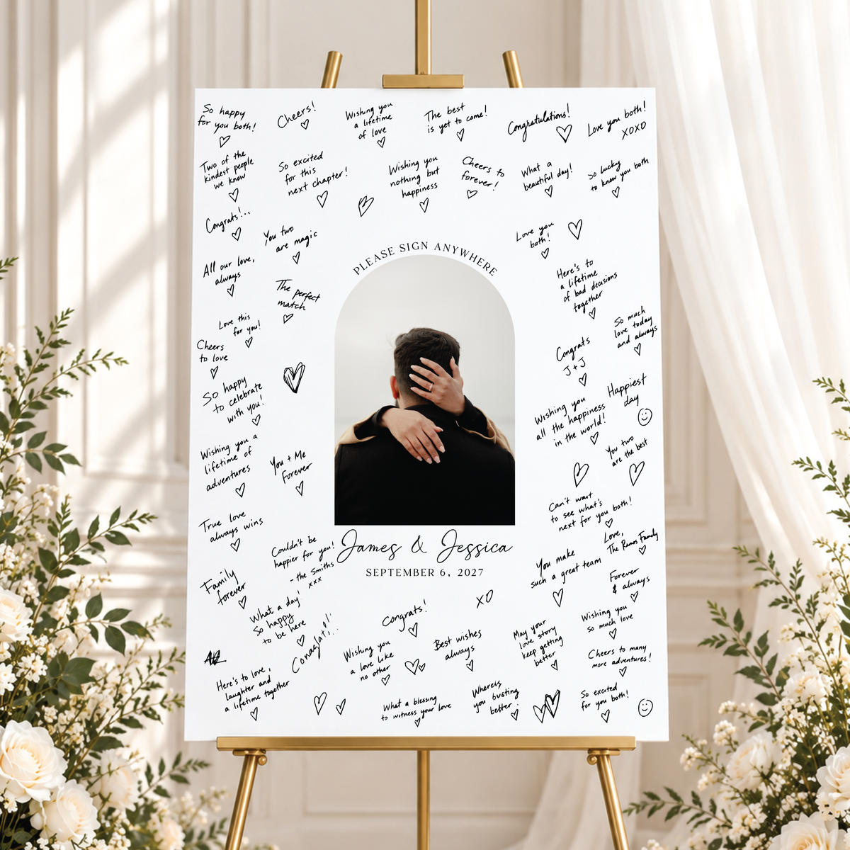 Personalized wedding photo guest book foam board sign featuring a couple's photo, names, wedding date, and handwritten guest messages, displayed on a gold easel.